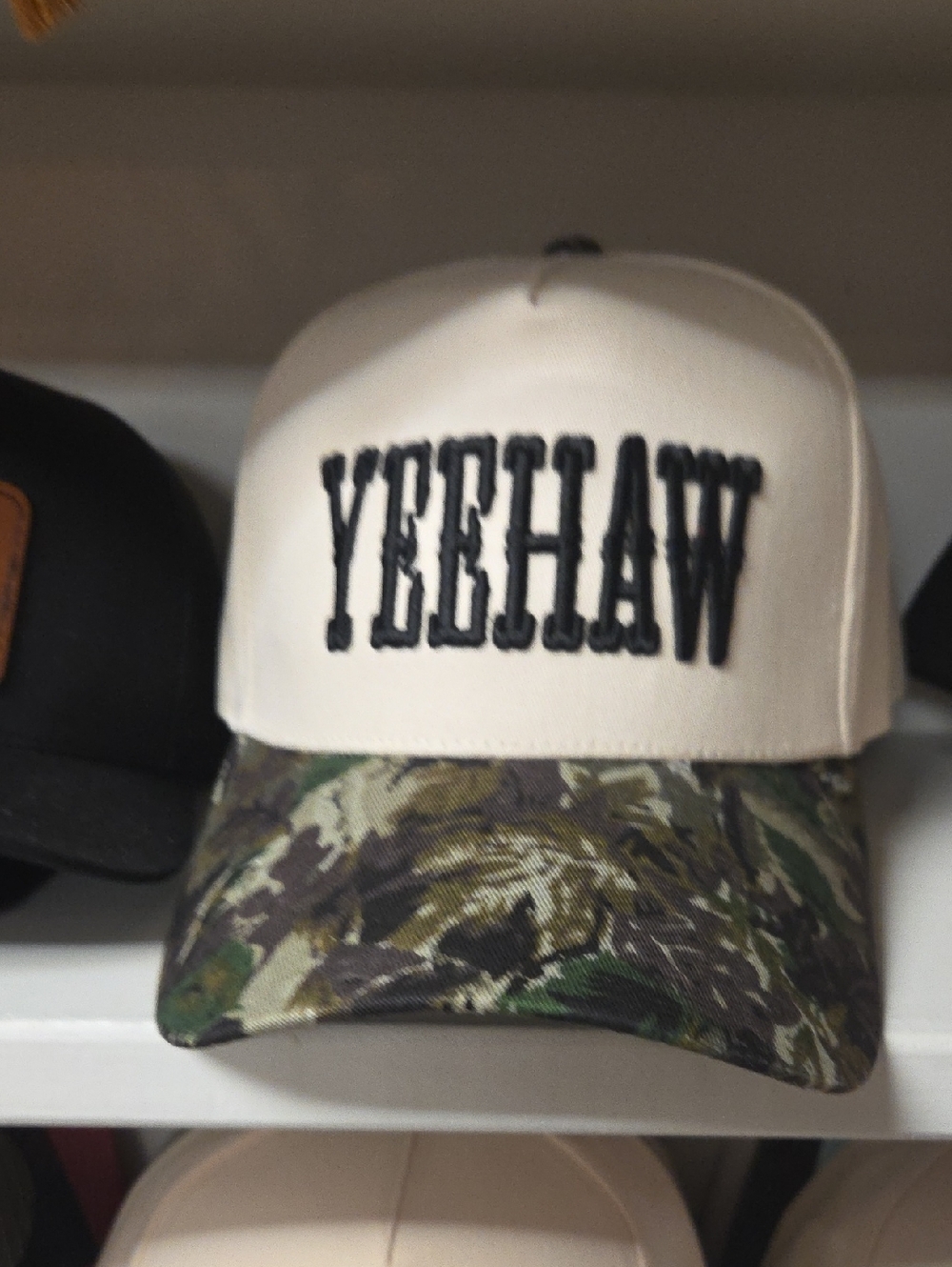 YEEHAW Cream Trucker Hat with Camo Bill